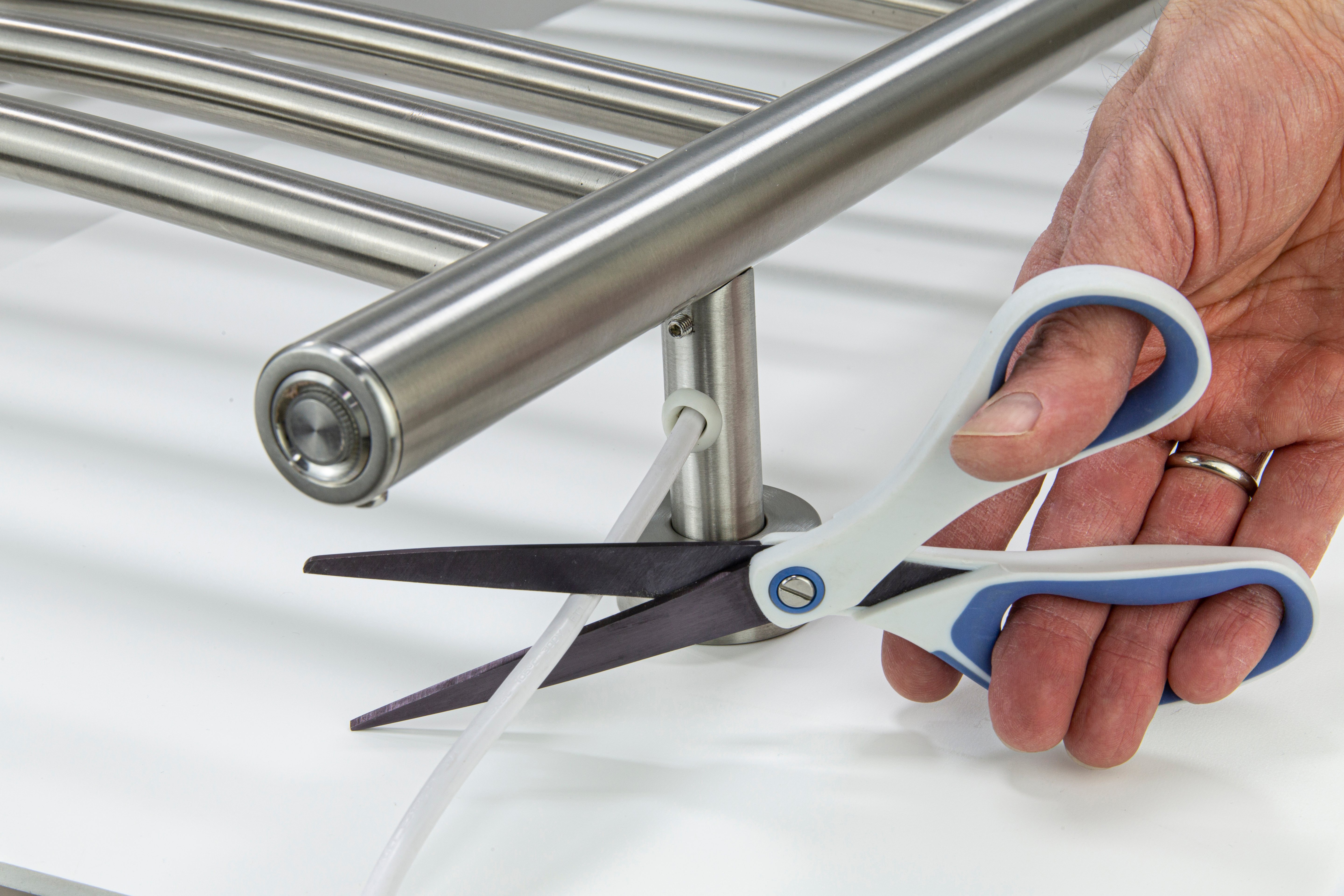 Dual connection towel warmer being converted to plug-in