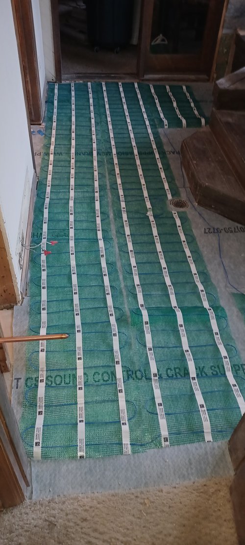 Wellman Luxury master bath remodel installing tempzone flex roll floor heating