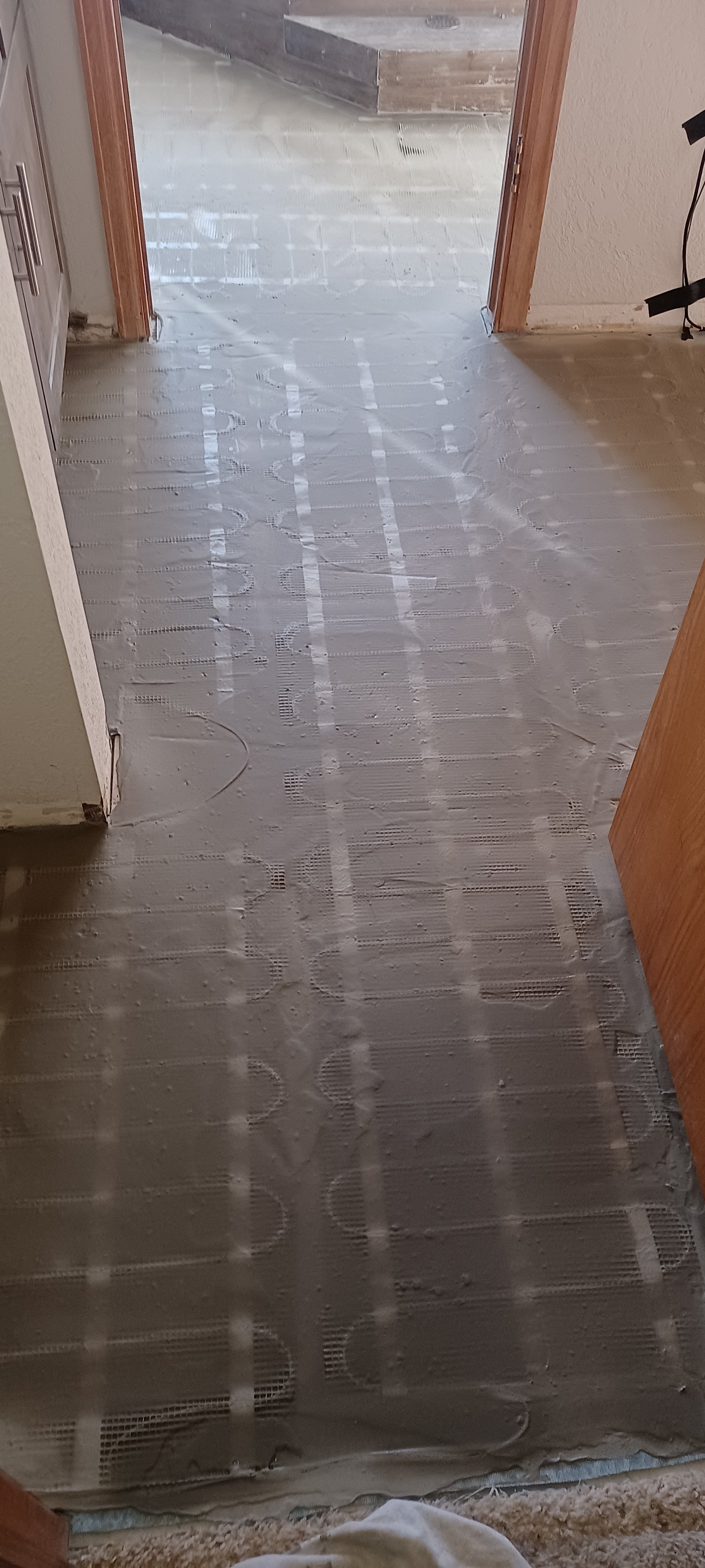 Wellman Luxury master bath remodel during install of electric floor heating