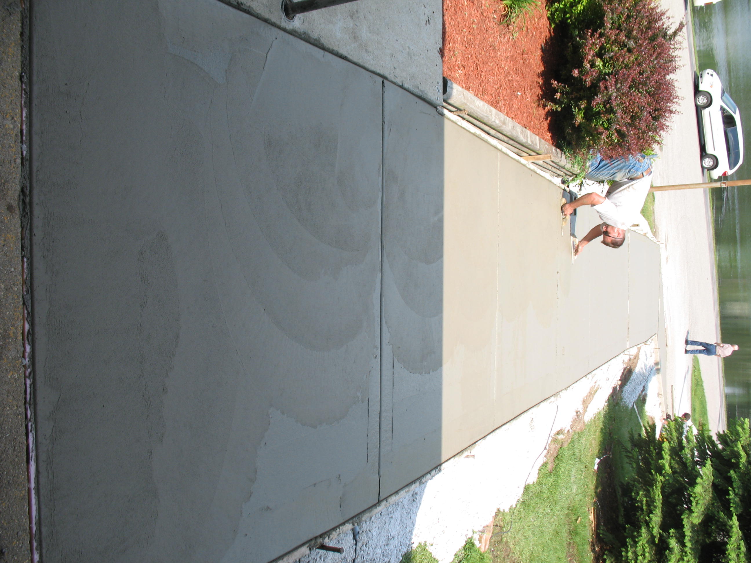 Snow melting on concrete in a ramp in Union Mills, IN — after.