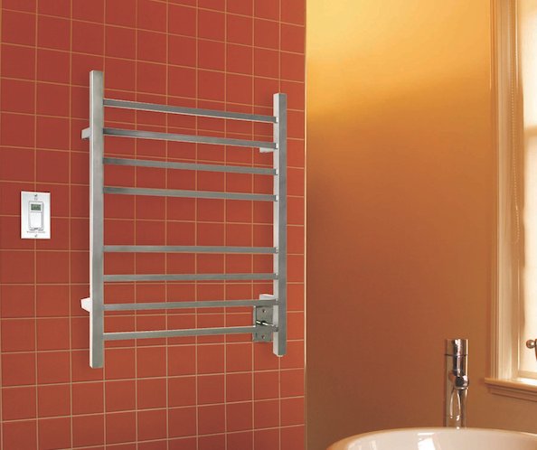 A hard-wired Sierra towel warmer adds to this bathroom decor