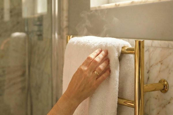 Gold Heated Towel Warmer Provides Bathroom Warmth and Comfort