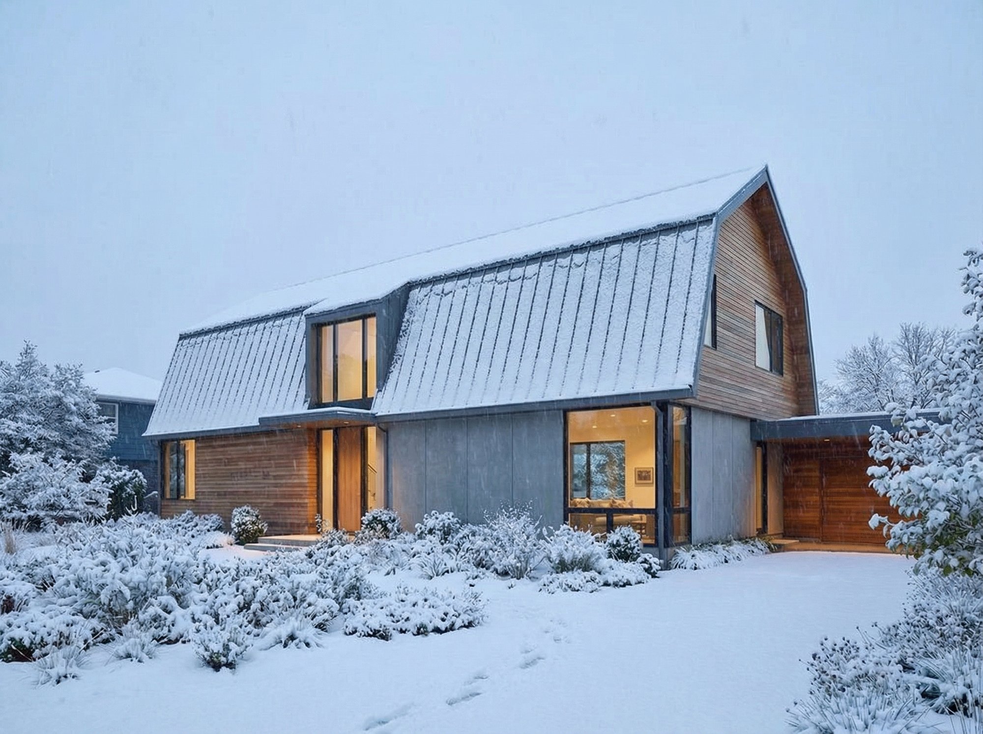 Heated Driveway Melts Snow in Front of Modern Home