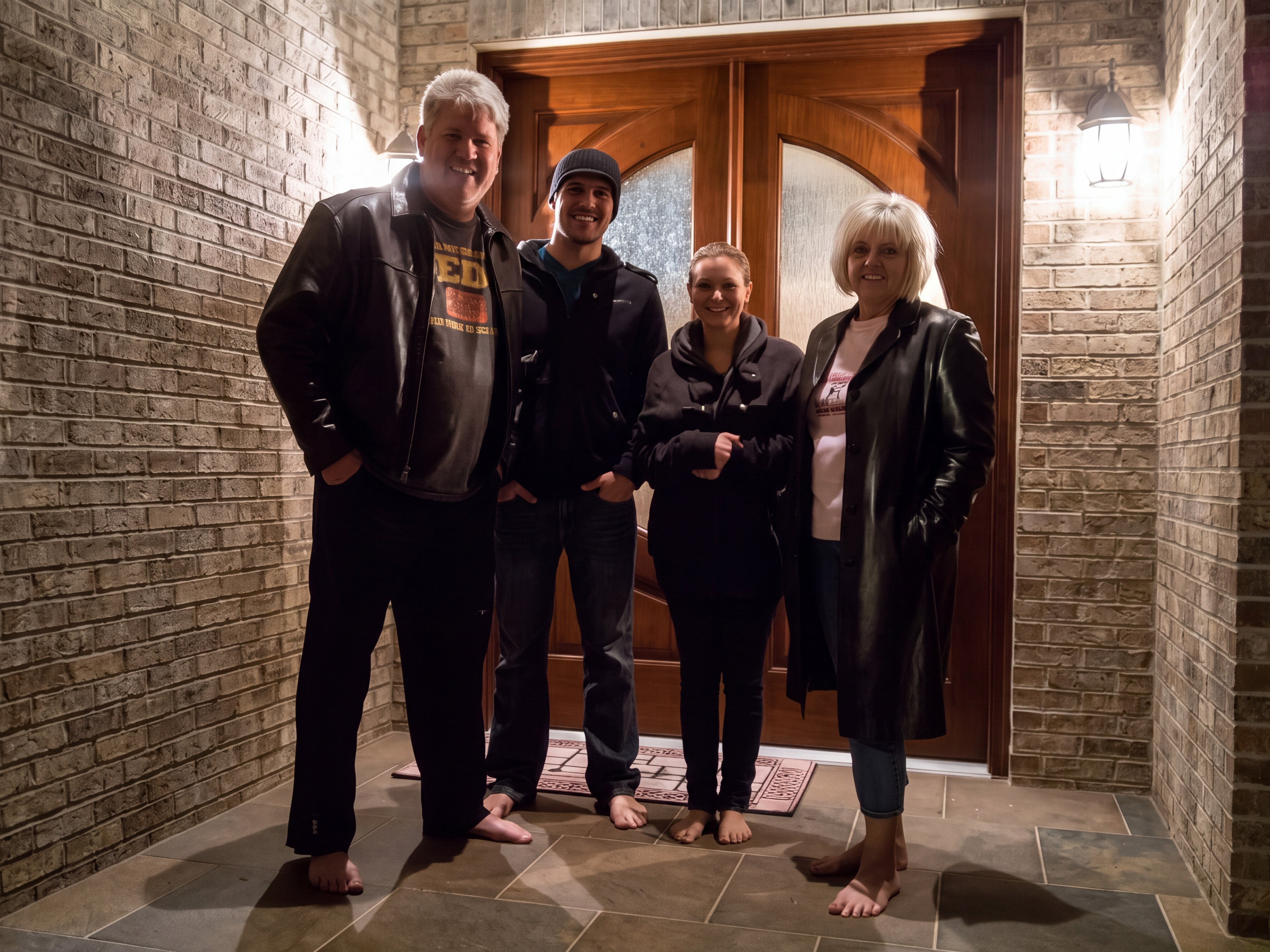 Barefoot on a snow-melted porch in winter coats, Indianapolis