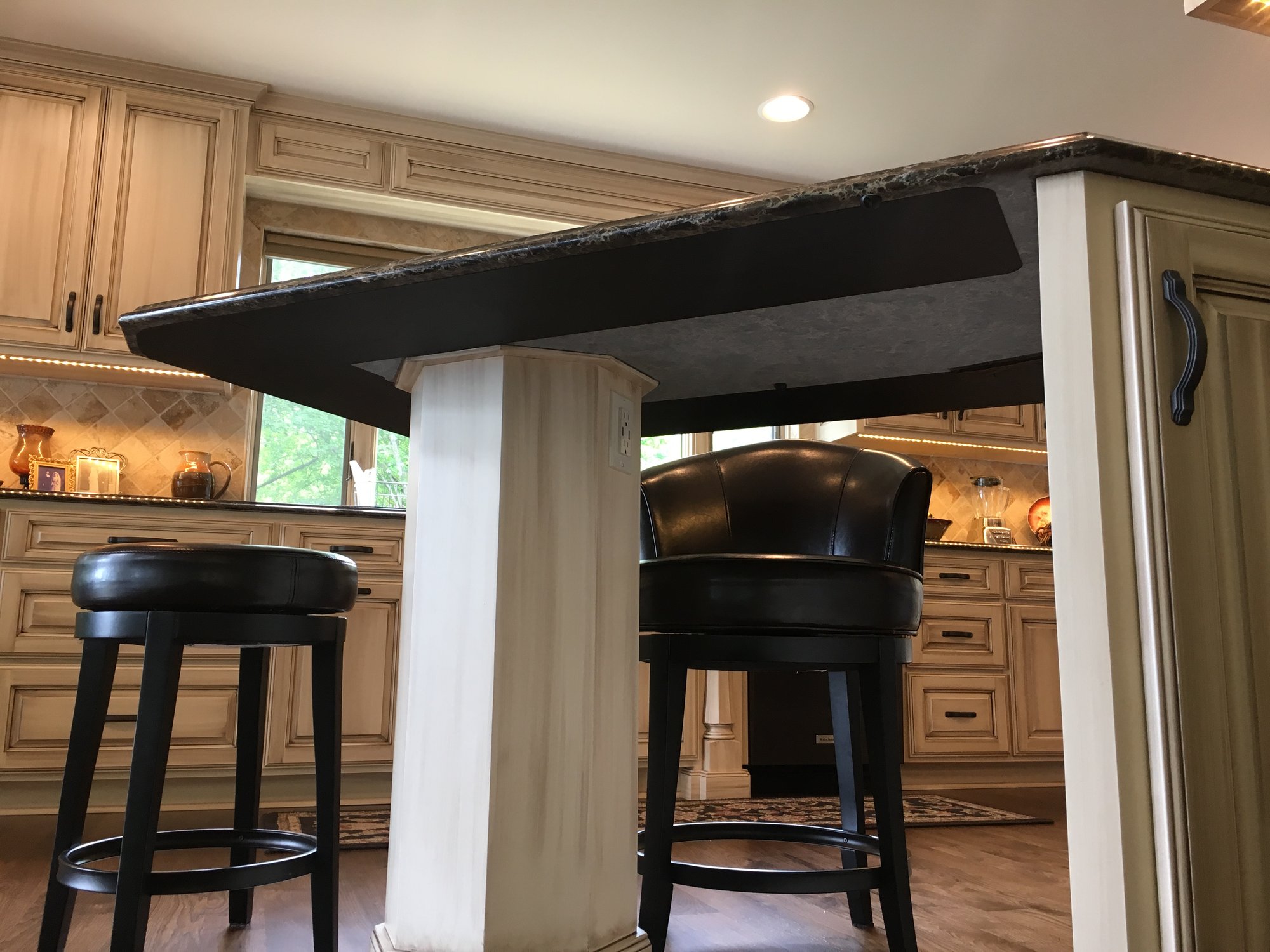 An Electric Countertop Heater Installed Under a Counter in a Kitchen