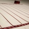 Angled Shot of TempZone Floor Heating Cable with Fixing Strips