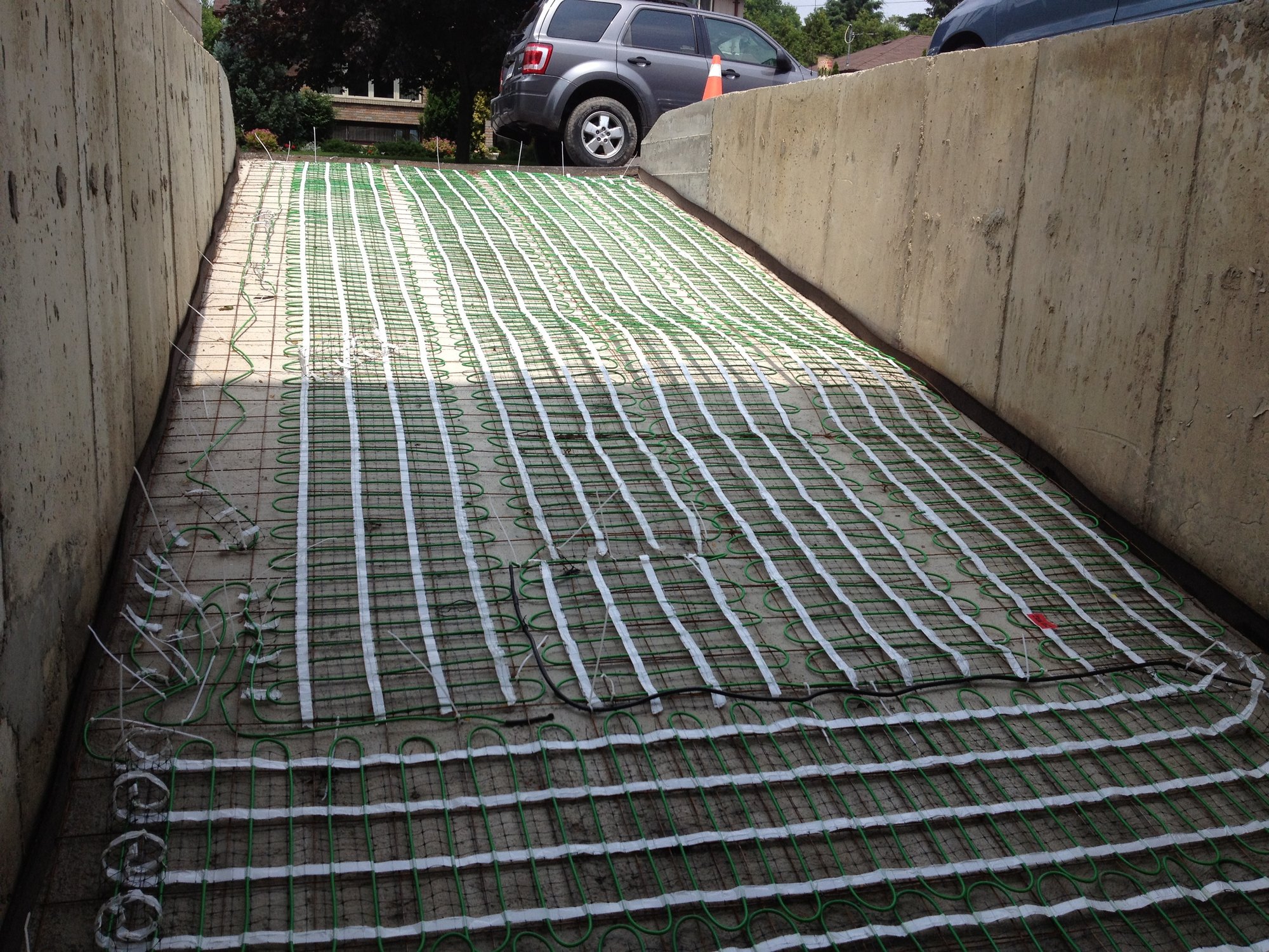 Angled Snow Melting Install for Heated Concrete Driveway SCARBOROUGH, ON
