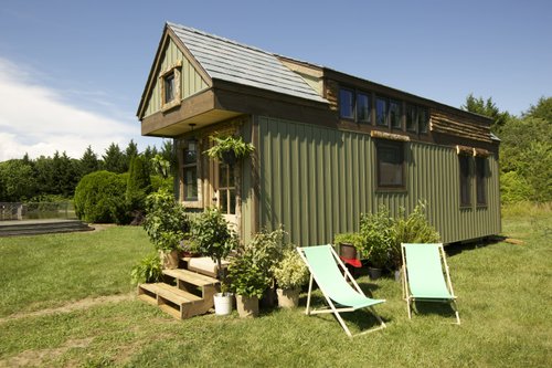 As seen on FYI's Tiny House Nation - Floor heating feature for laminate and environ exterior side