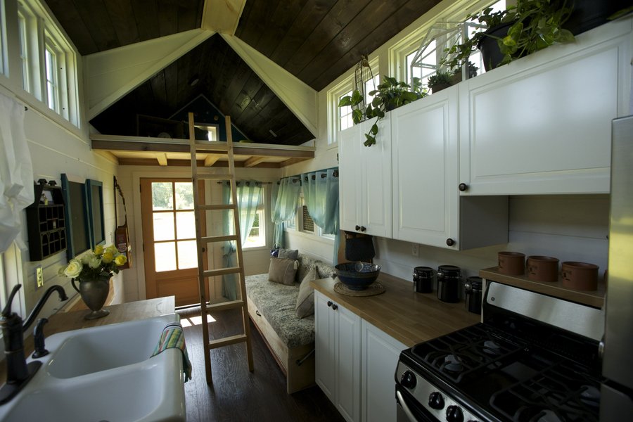 As seen on FYI's Tiny House Nation - Floor heating feature for laminate and environ