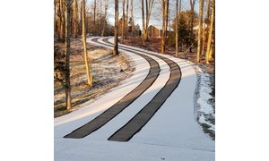 Asphalt Driveway with Snow Melting Tire Tracks