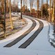 Asphalt Driveway with Snow Melting Tire Tracks
