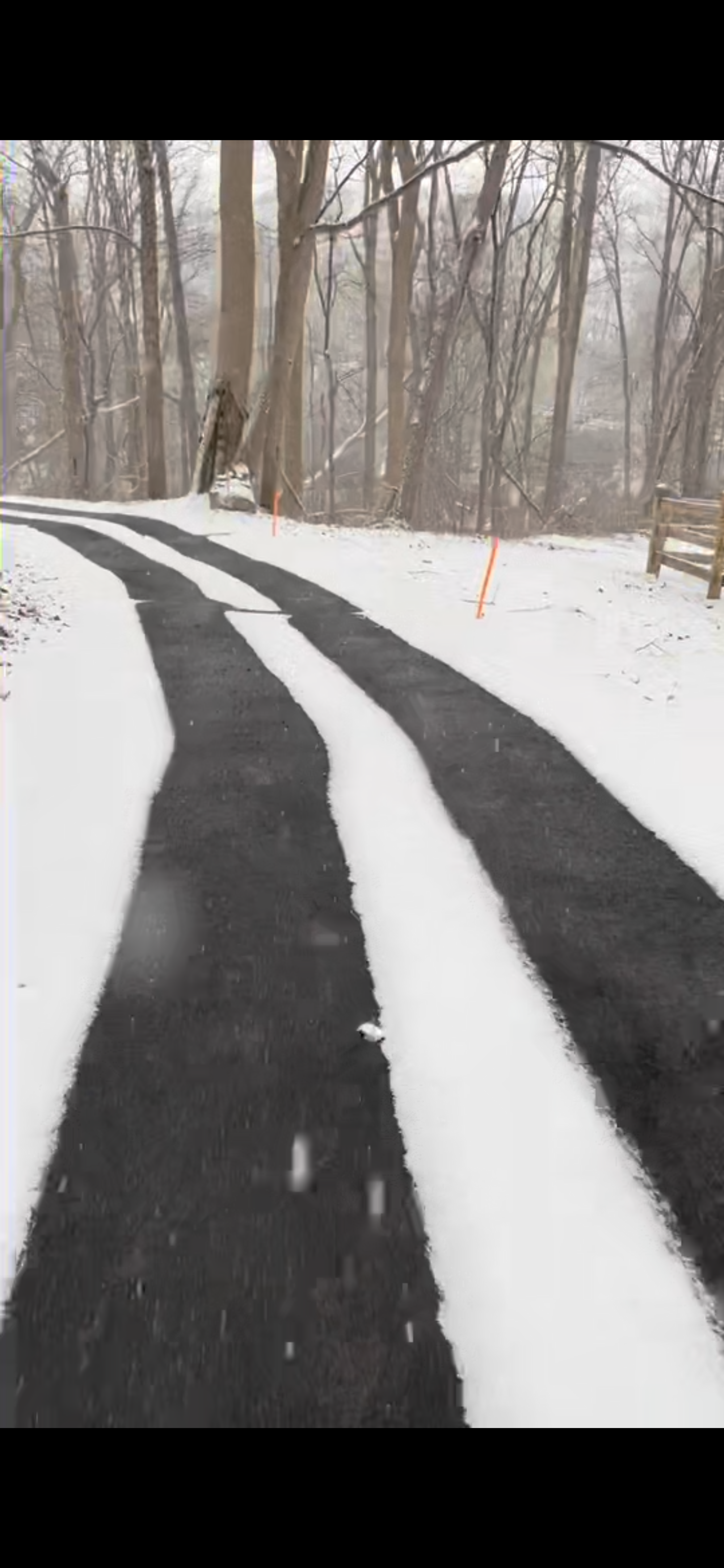 Asphalt Snow Melt tire tracks during winter 1 ELVERSON, PA