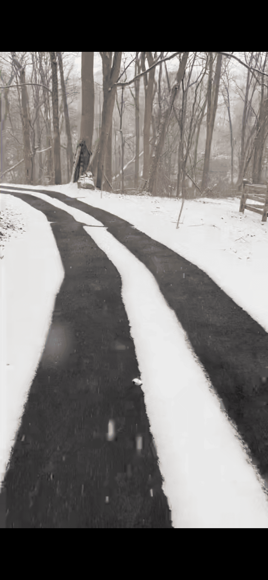 Asphalt Snow Melt tire tracks during winter 1 ELVERSON, PA