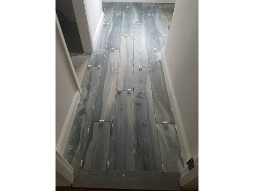 Attic hallway with heated grey tile flooring PROVIDENCE, RI