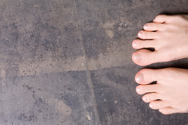 Bare feet on concrete