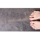 Bare feet on concrete