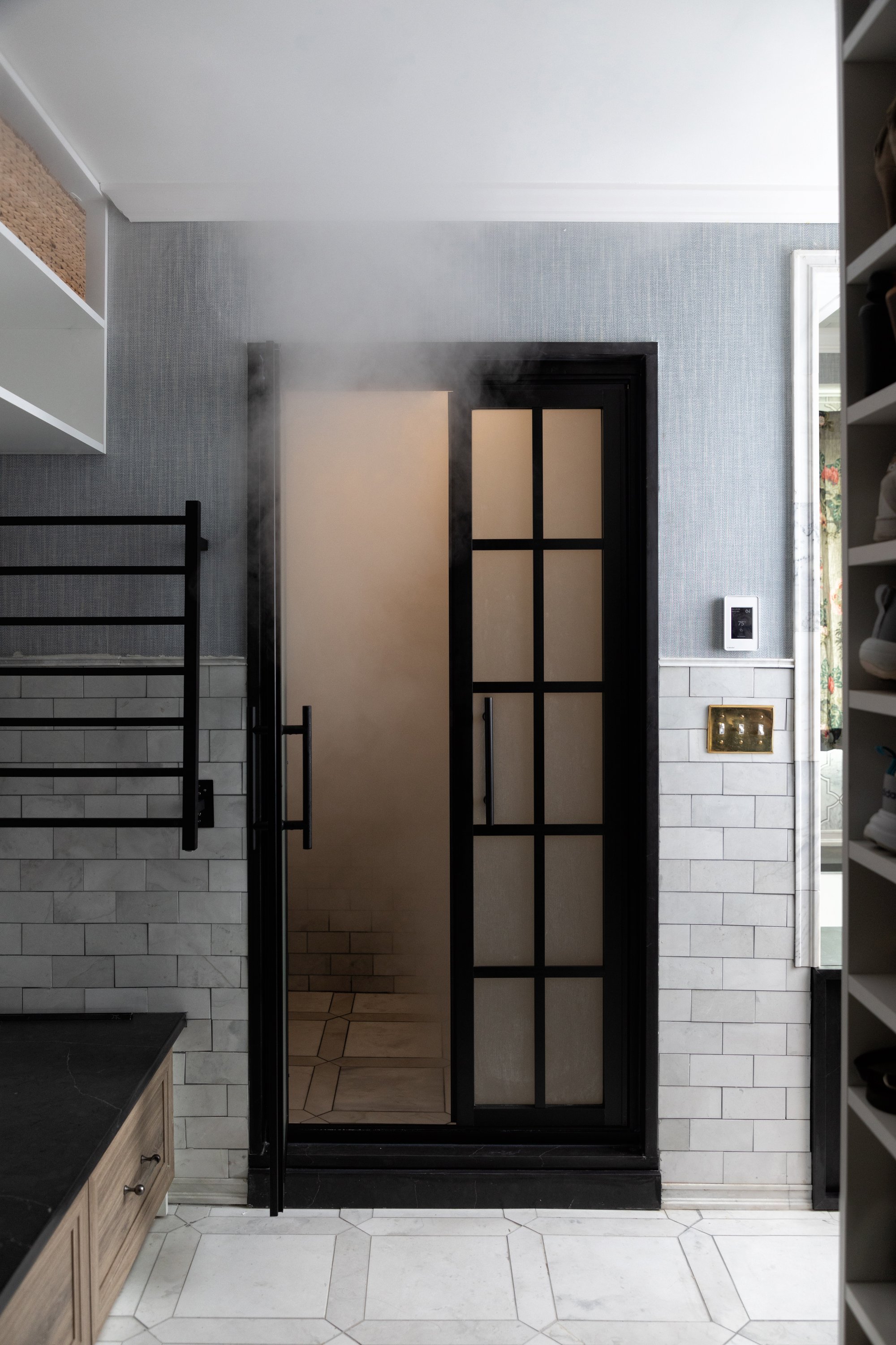 Bargain mansions tamara day master bathroom with towel warmer and floor heating steam room view