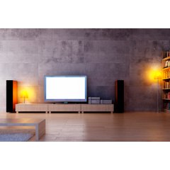 A modern living room featuring a low light-wood entertainment console, concrete tile wall, and light-toned flooring.