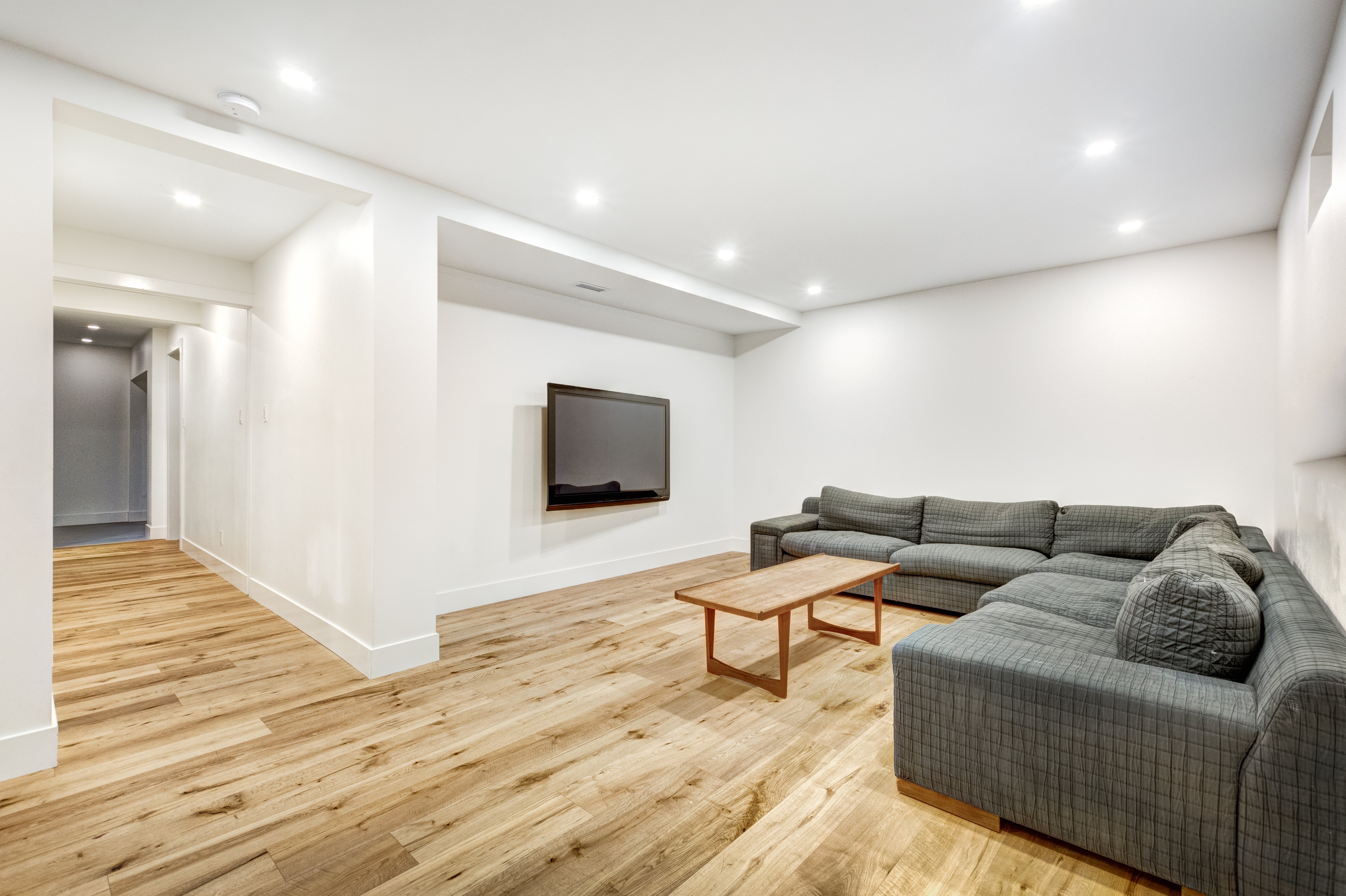 Basement stock photo with wood looking floors