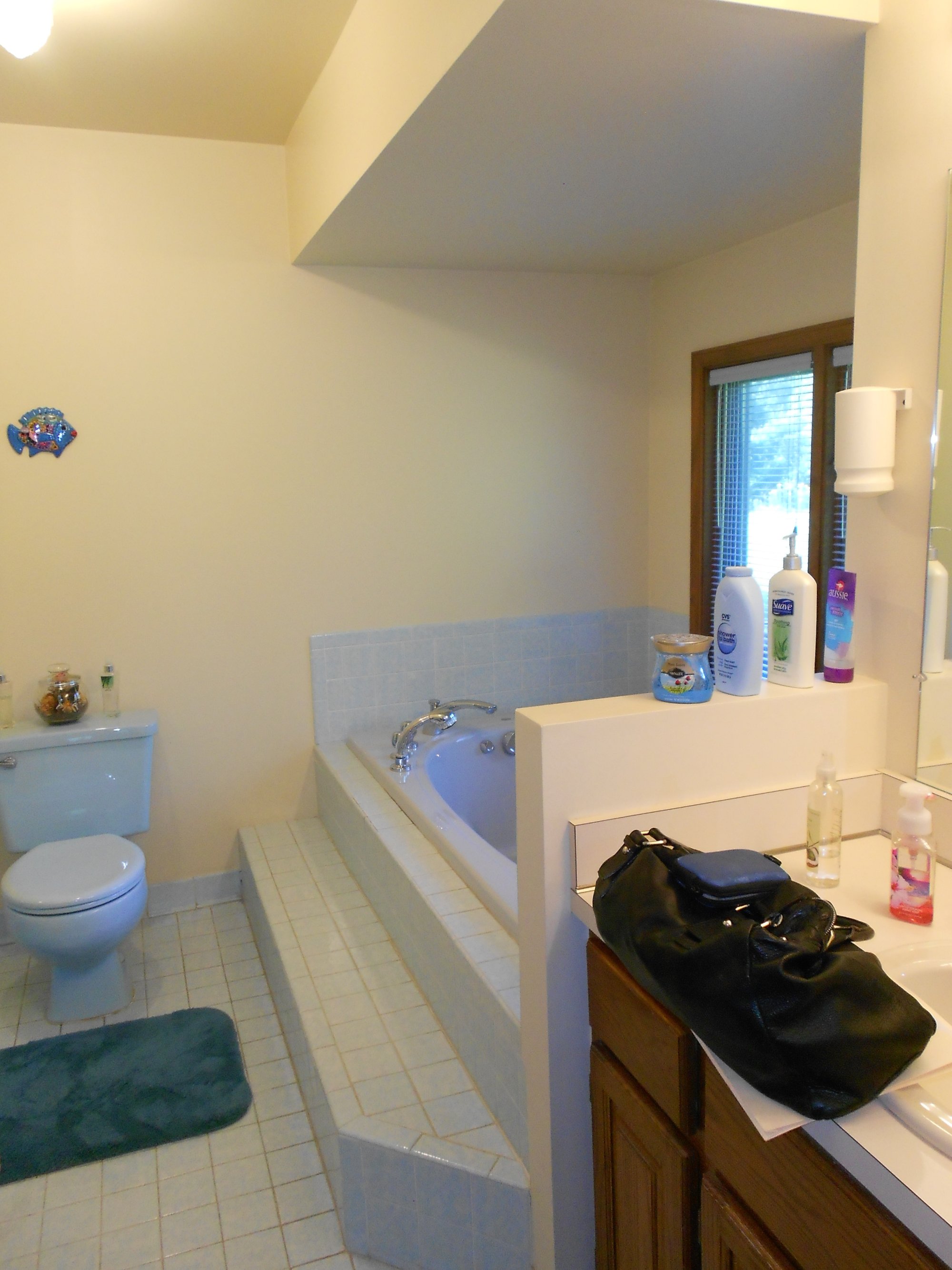 Bathroom before and after with radiant heating before shot