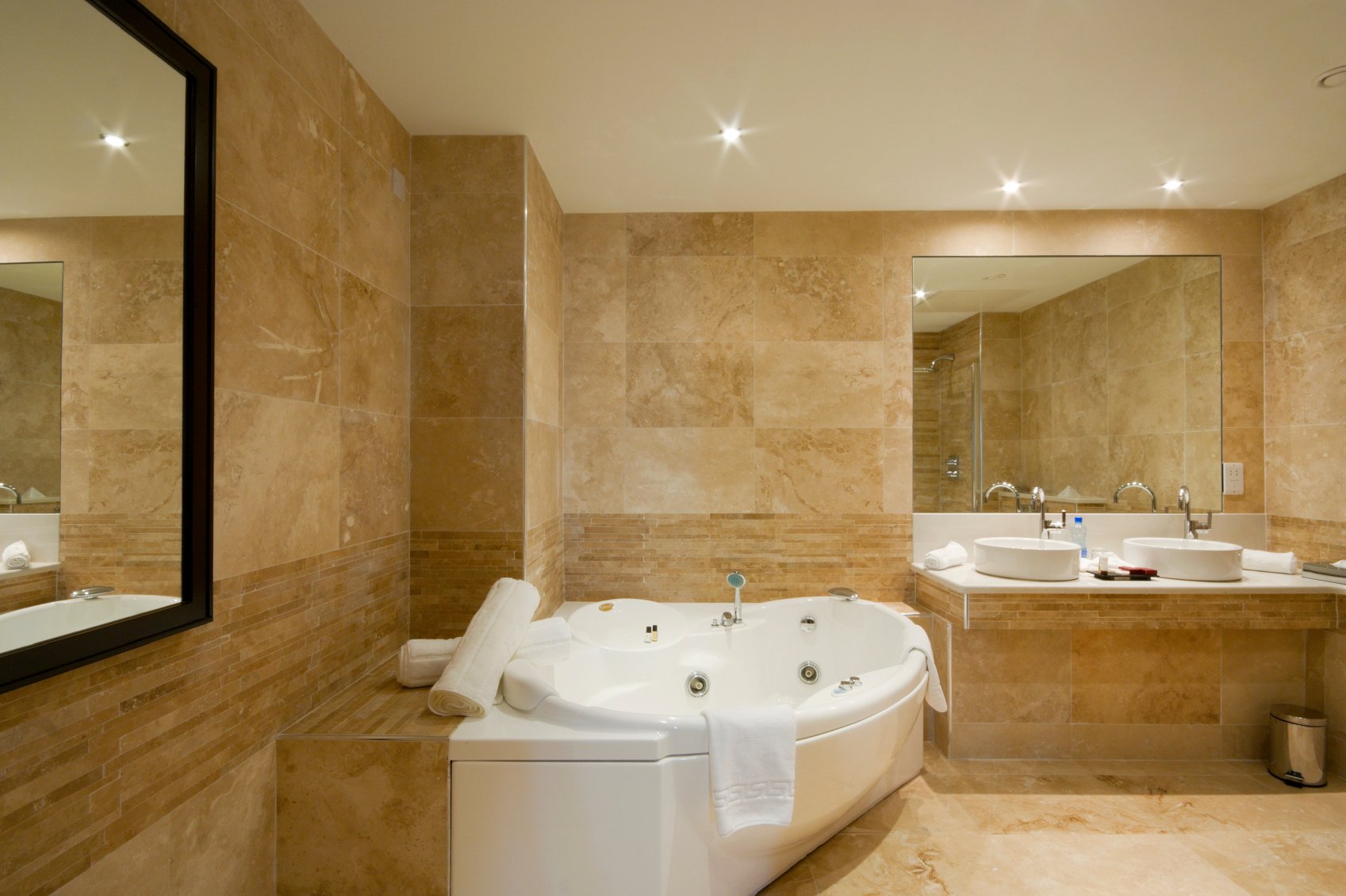 Bathroom with large wall and floor tile
