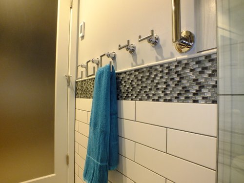 Bathroom Remodel with floor heating close-up of towel