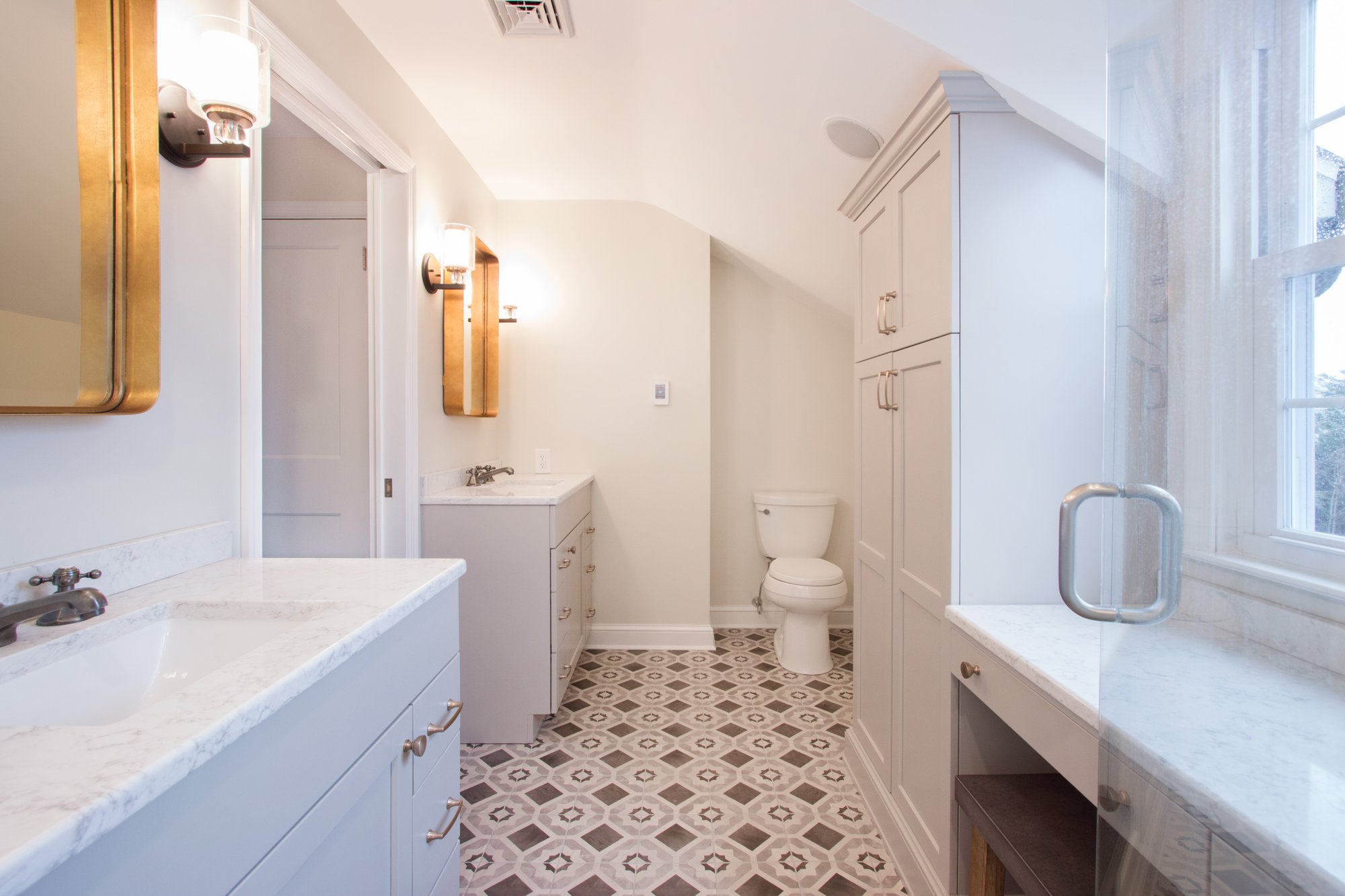 Bathroom Remodel with two vanities and underfloor heating with tile