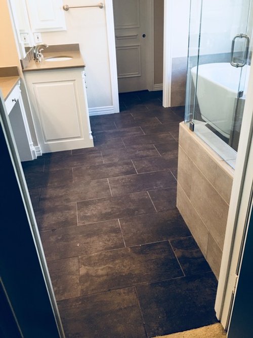 Bathroom with heated  TempZone under dark tile floor DALLAS, TX