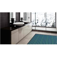 A cutaway view of a TempZone electric radiant floor heating mat with blue heating cable on green mesh installed beneath a modern bathroom floor.