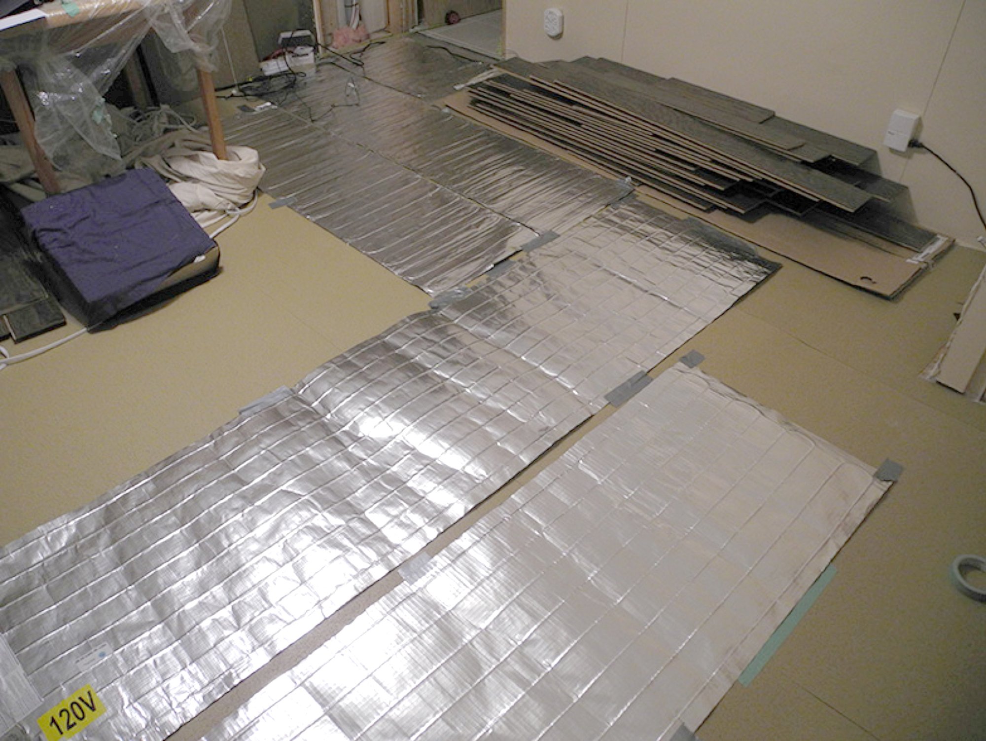 Bedroom with environ flex roll heating mats laid out COQUITLAM, BC