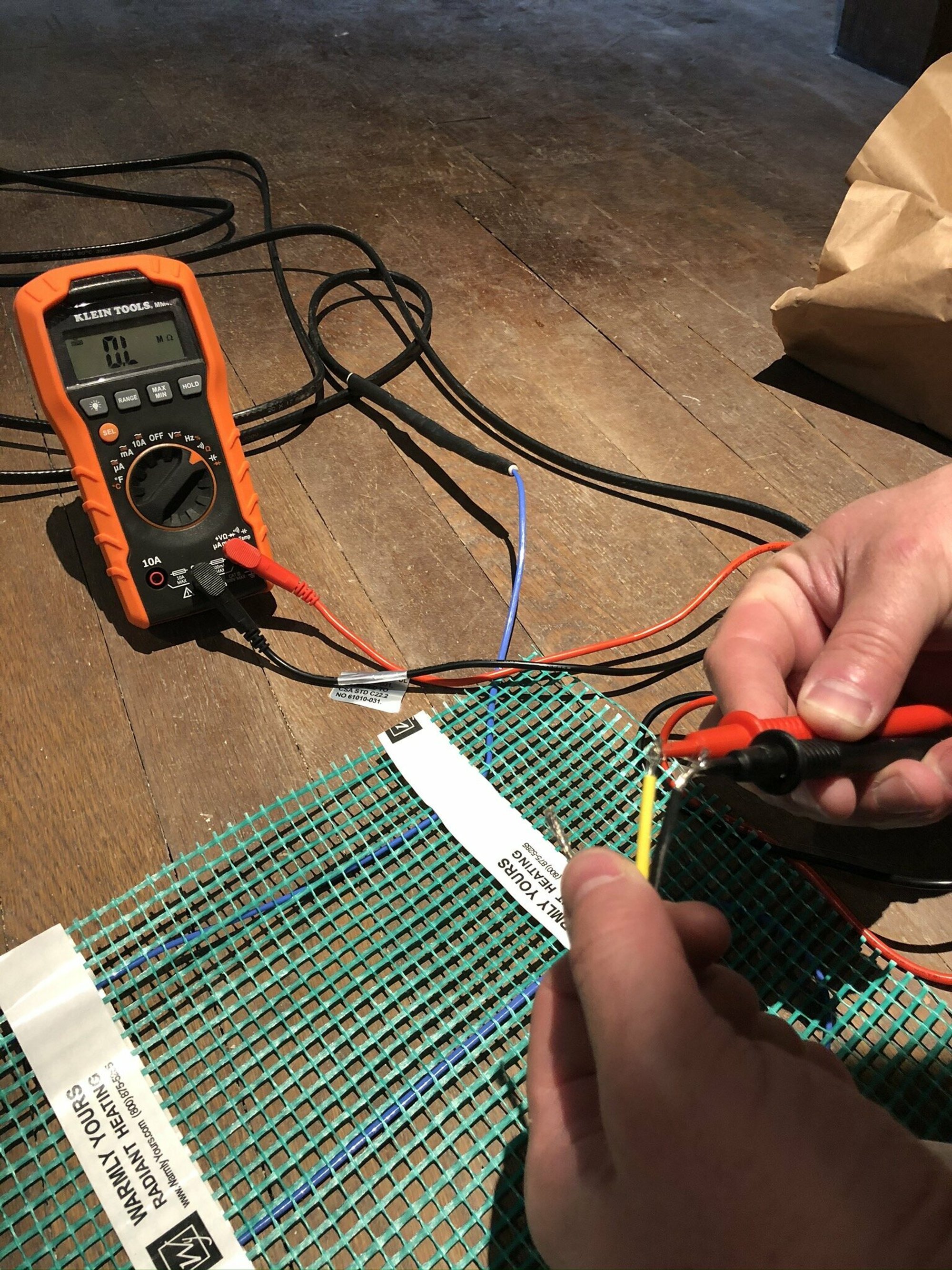 Brook & Stone Kitchen Remodel with electric floor heating testing mats during installation