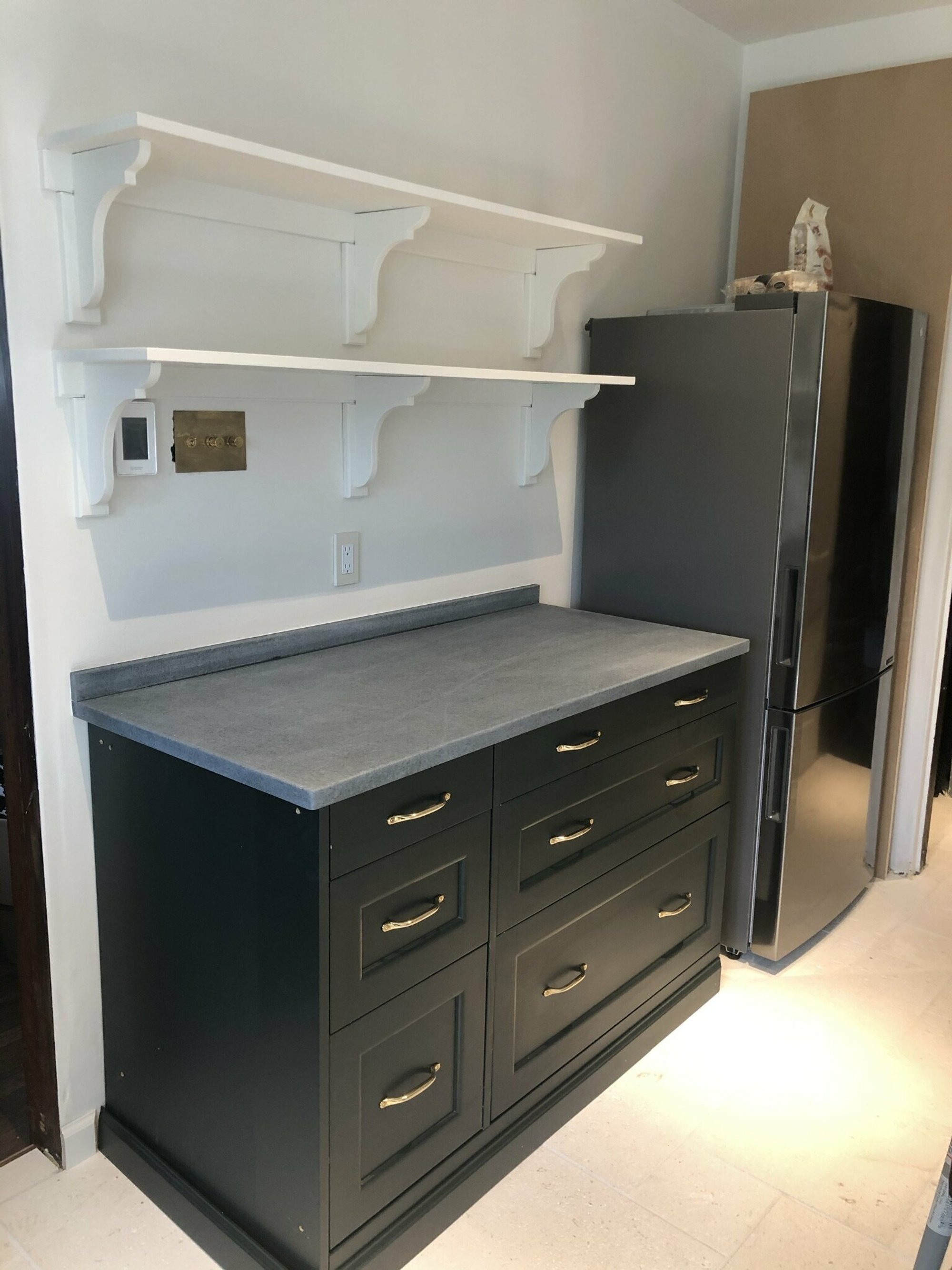 Brook & Stone Kitchen Remodel with electric floor heating with thermostat underneath floating shelves