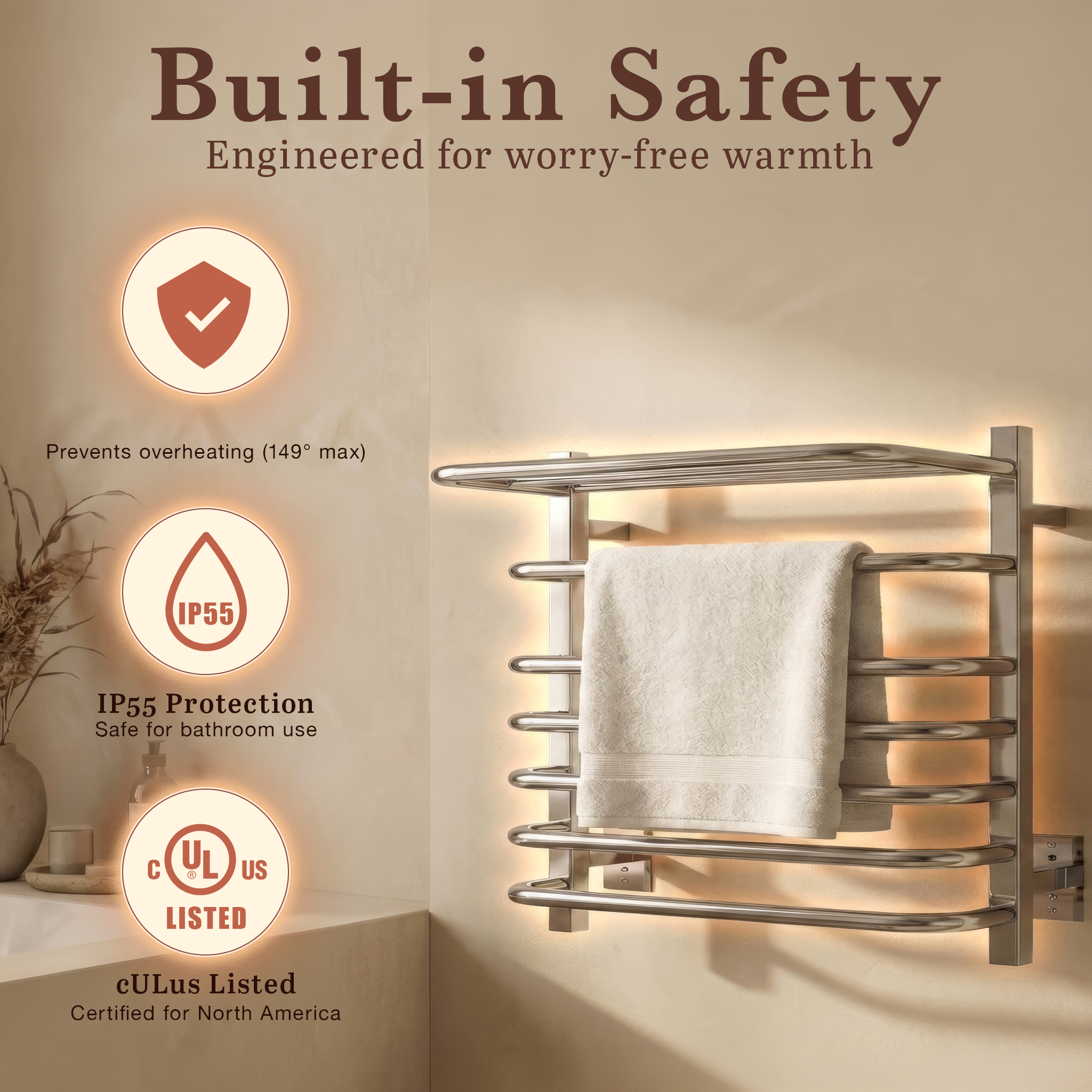 Vancouver towel warmer with polished stainless steel finish and integrated shelf holding a towel, mounted on a bathroom wall.