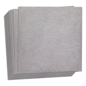 A stack of square CeraZorb thermal insulation underlayment sheets for electric radiant floor heating systems.