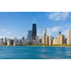 The Chicago lakefront skyline featuring the 875 North Michigan Avenue skyscraper and surrounding high-rise buildings along the shoreline.