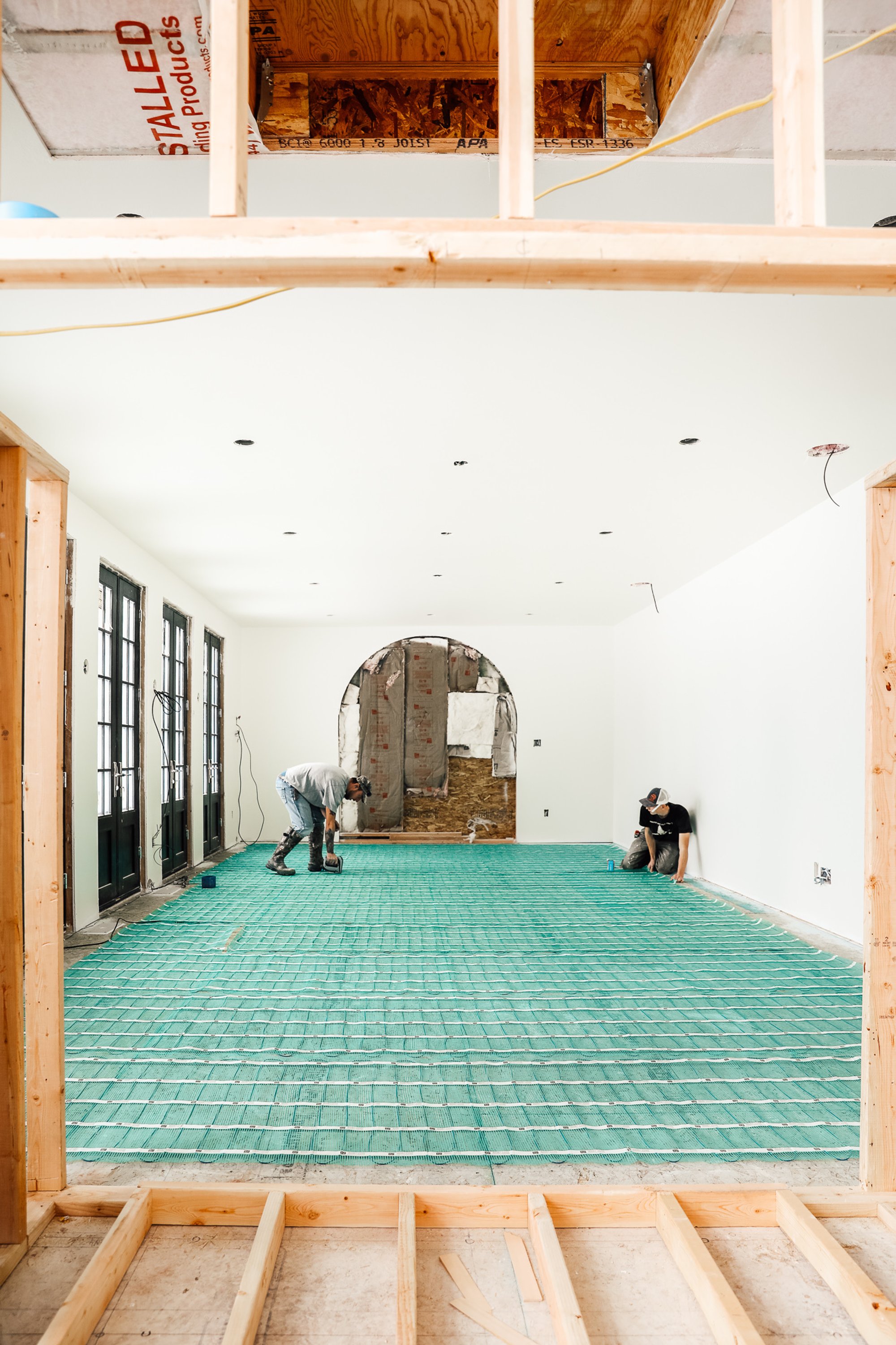 Chris Loves Julia Installation of Floor Heating Under Tile for Dining Room fireplace framing