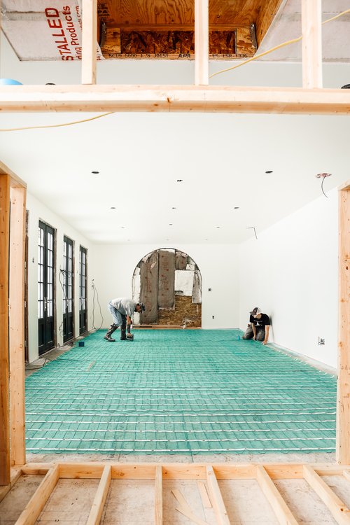 Chris Loves Julia Installation of Floor Heating Under Tile for Dining Room fireplace framing