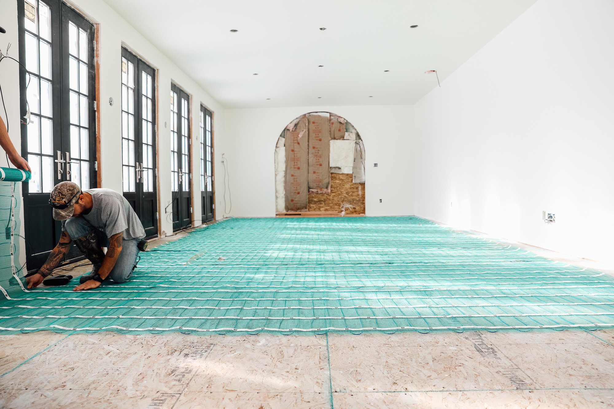 Chris Loves Julia Installation of Floor Heating Under Tile for Dining Room low full room view