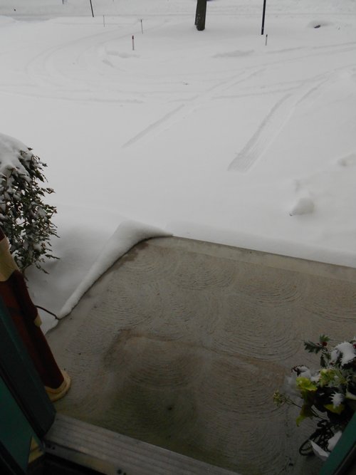 Clear front porch thanks to snow melting.