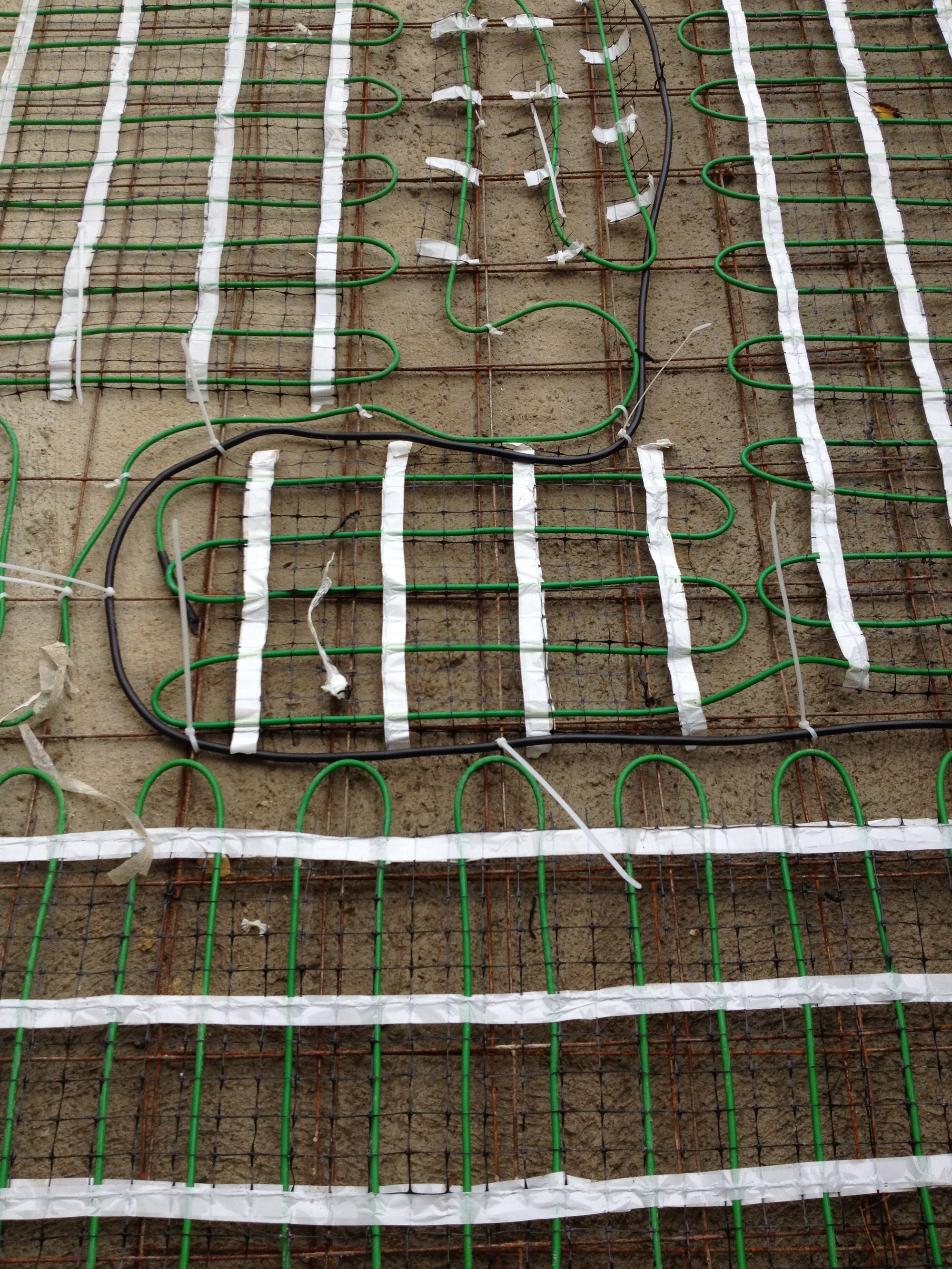Closeup Snow Melting Install for Heated Concrete Driveway SCARBOROUGH, ON