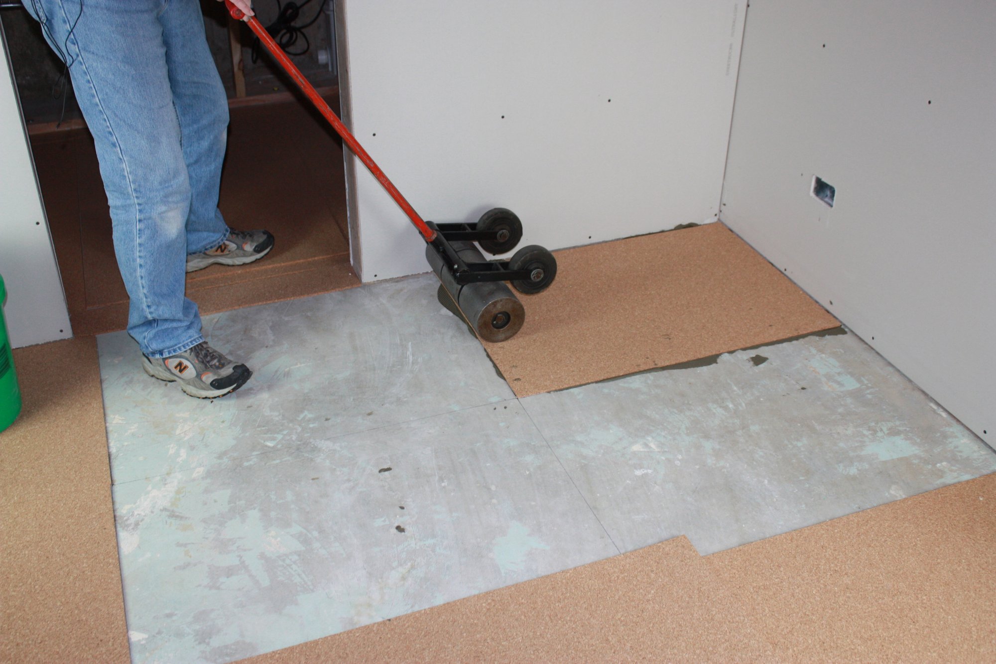 Cork underlayment installation with tempzone flex roll adhering cork