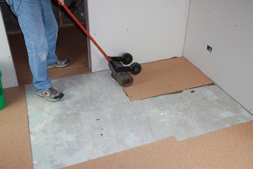 Cork underlayment installation with tempzone flex roll adhering cork