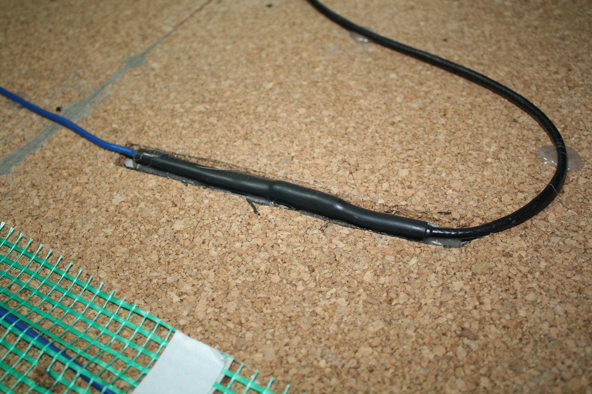 Cork underlayment installation with tempzone flex roll splice embedded