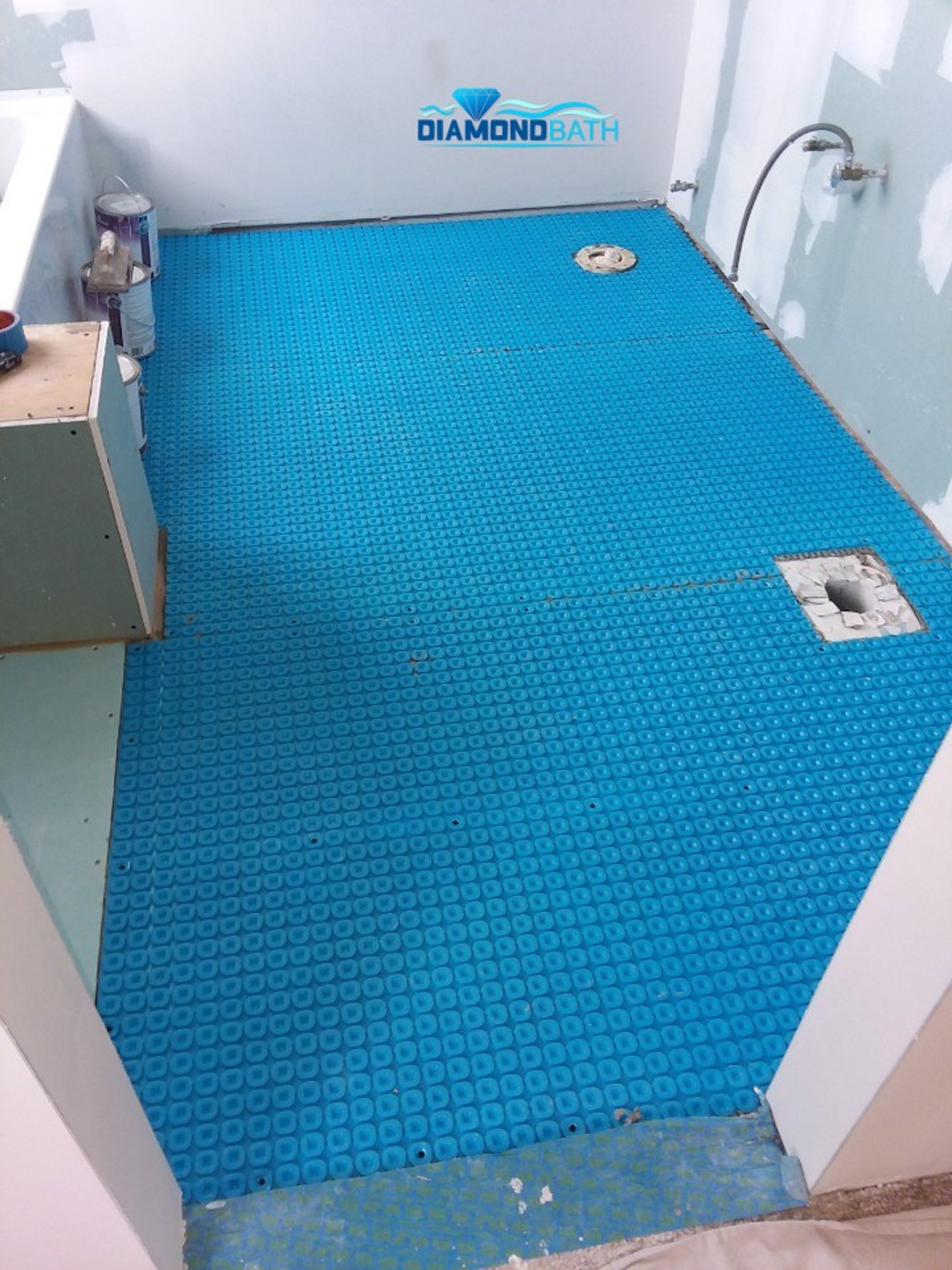Diamond Bath installation of Prodeso uncoupling membrane for heated bathroom floor CRYSTAL LAKE, IL