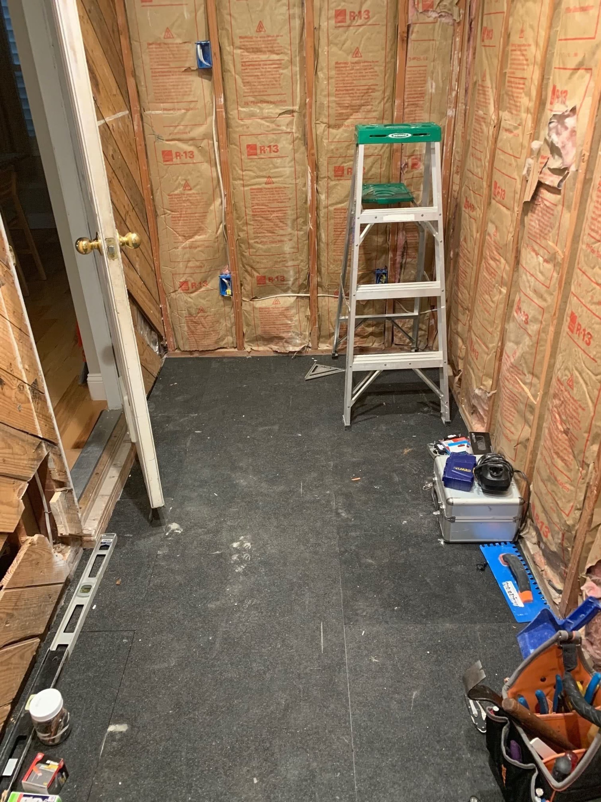 Electric floor heating installation in a mudroom with ThermalSheet