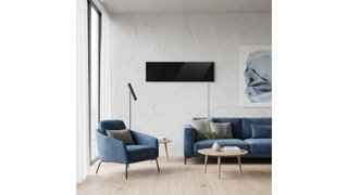 Ember Black Glass Radiant Panel Heater in Contemporary Living Room Setting