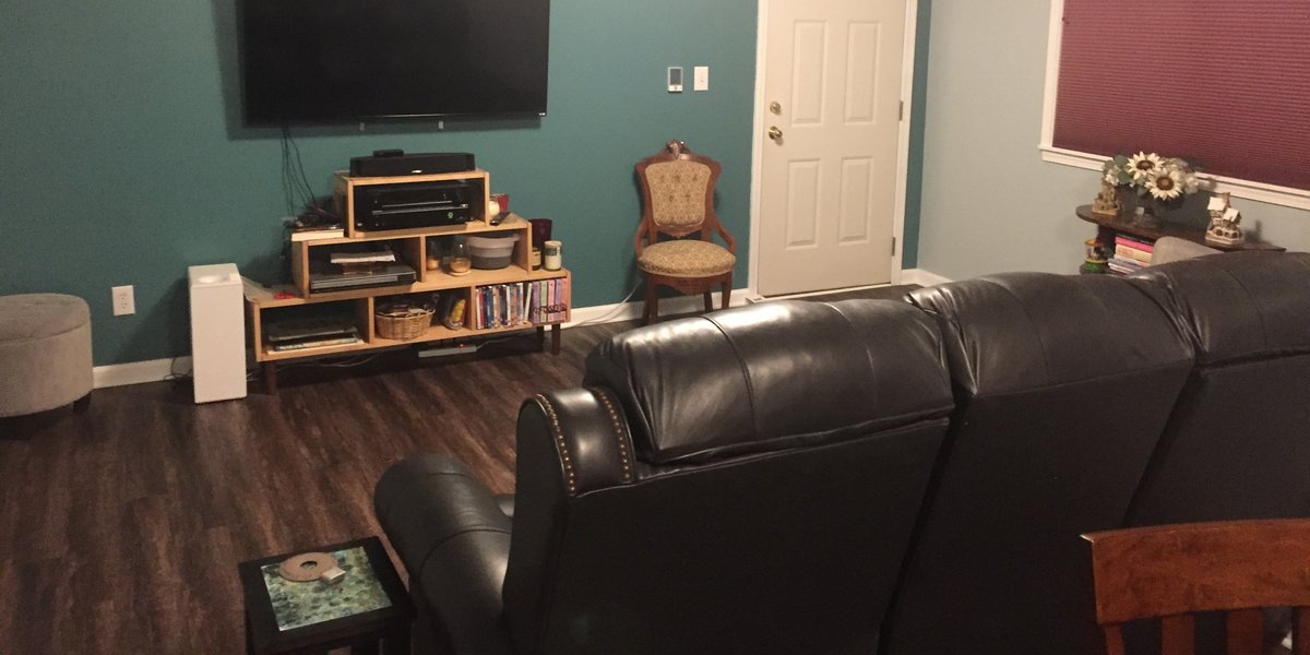 Finished media room with heated LVT floors