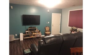 Finished media room with heated LVT floors
