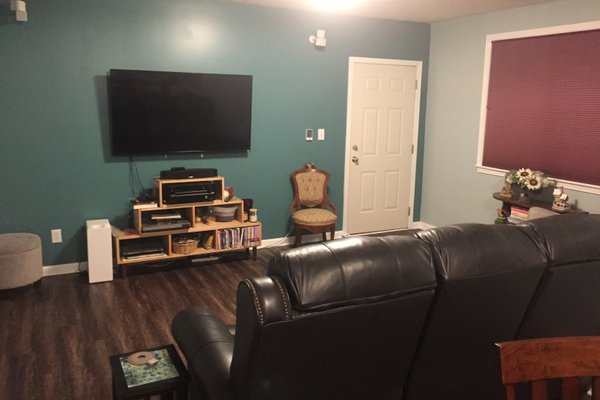 Finished media room with heated LVT floors