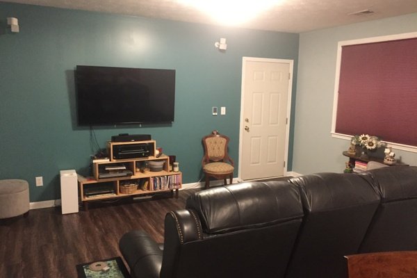 Finished media room with heated LVT floors